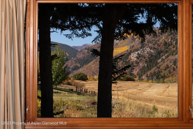 property view of mountains featuring a rural view