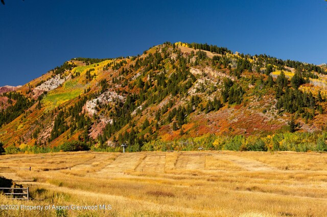 property view of mountains featuring a rural view