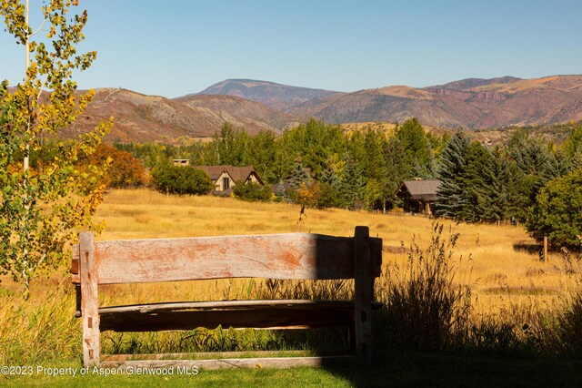 view of mountain feature with a rural view