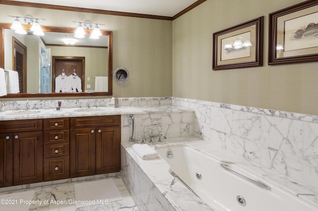 bathroom with tiled tub, vanity, and ornamental molding