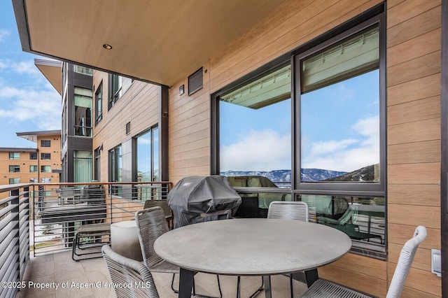 balcony featuring grilling area and a mountain view