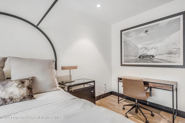 bedroom featuring wood-type flooring