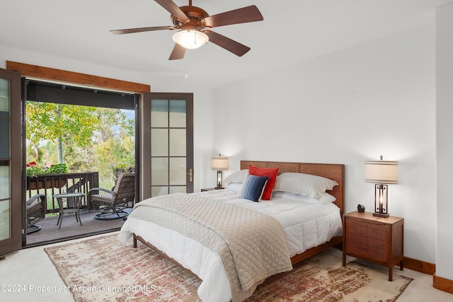 bedroom with access to outside and ceiling fan