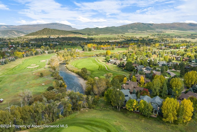 drone / aerial view featuring a mountain view