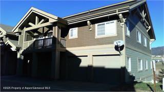 315 Riverview Dr Unit 1801, New Castle, CO 81647 - back of house featuring a garage and a balcony
