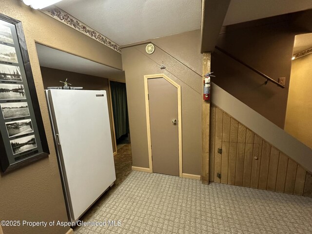 595 Colorado St, Craig, CO 81625 - hall featuring carpet floors and a textured wall