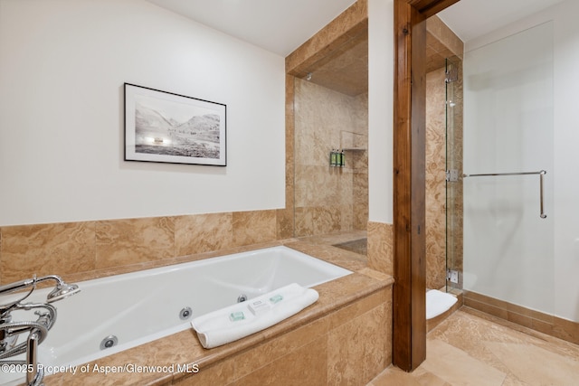 bathroom with separate shower and tub