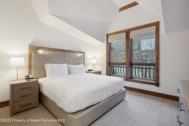 bedroom featuring vaulted ceiling