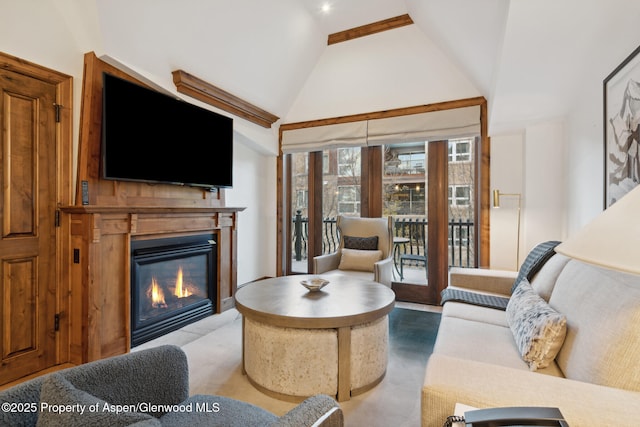 living room featuring high vaulted ceiling