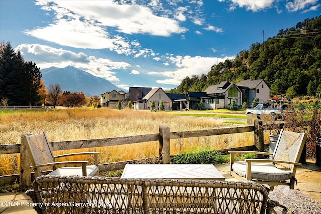 view of patio / terrace with a mountain view