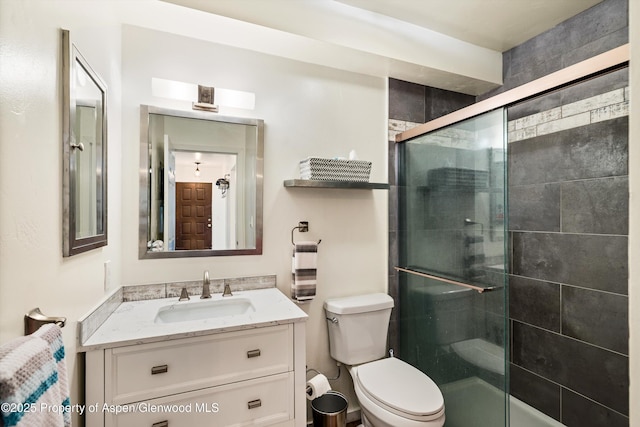 3215 Hager Ln Unit 2, Glenwood Springs, CO 81601 - bathroom featuring toilet, a stall shower, and vanity