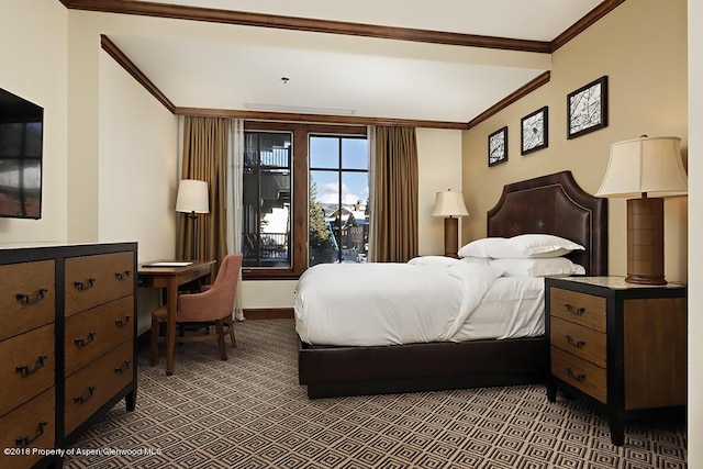 bedroom with baseboards, ornamental molding, and carpet flooring