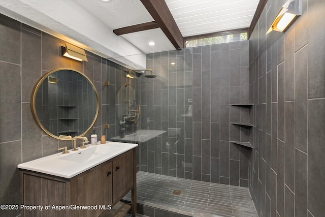 116 S Bill Creek Rd, Carbondale, CO 81623 - full bath with vanity, tiled shower, tile walls, and beam ceiling