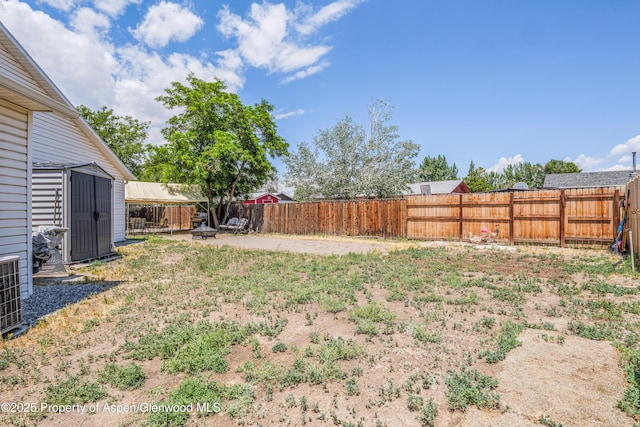 473 Robin Ct, Grand Junction, CO 81504 - fenced backyard with a storage unit