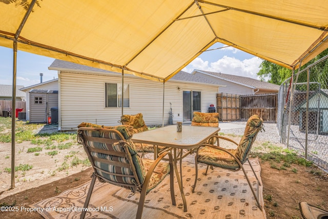 473 Robin Ct, Grand Junction, CO 81504 - view of patio / terrace with outdoor dining area and an outdoor structure