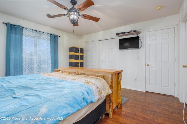 473 Robin Ct, Grand Junction, CO 81504 - bedroom with wood finished floors, a closet, and a ceiling fan