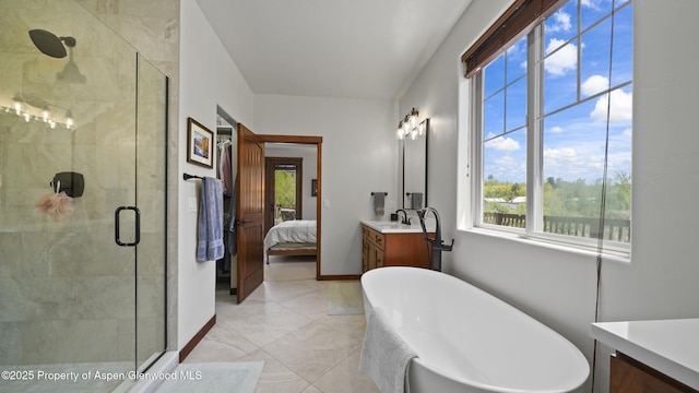 bathroom with vanity and plus walk in shower