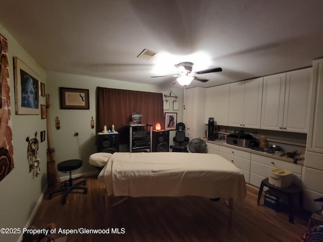 27461/2 Laguna Dr, Grand Junction, CO 81503 - bedroom with wood finished floors, visible vents, a ceiling fan, and baseboards