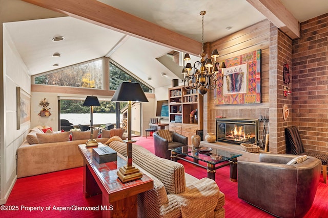 625 S W End St Unit 12, Aspen, CO 81611 - living area with a glass covered fireplace, a chandelier, and wood finished floors