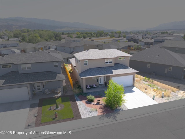 1149 E 17th St, Rifle, CO 81650 - aerial view of residential area with a mountainous background