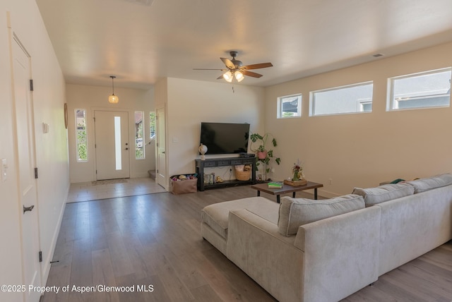 1149 E 17th St, Rifle, CO 81650 - living area featuring wood finished floors and ceiling fan