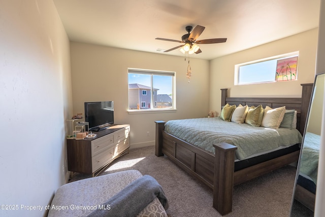 1149 E 17th St, Rifle, CO 81650 - carpeted bedroom featuring a ceiling fan and baseboards