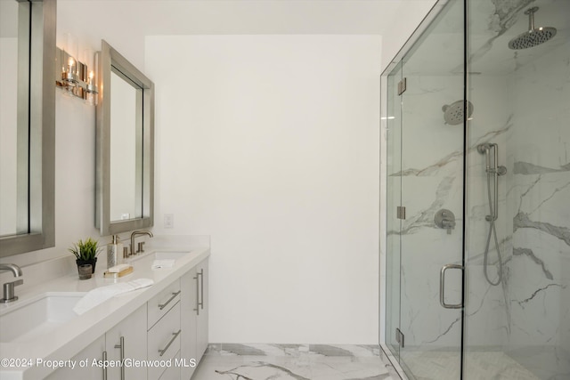 bathroom with vanity and an enclosed shower