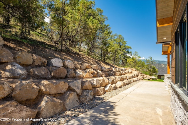 view of patio with a mountain view