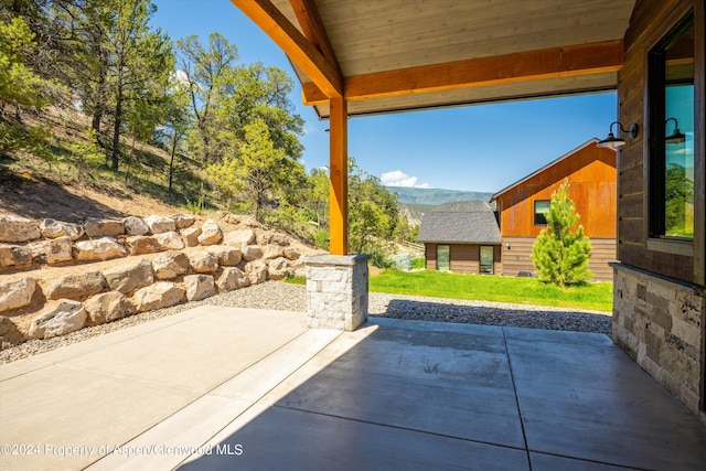 view of patio featuring a mountain view