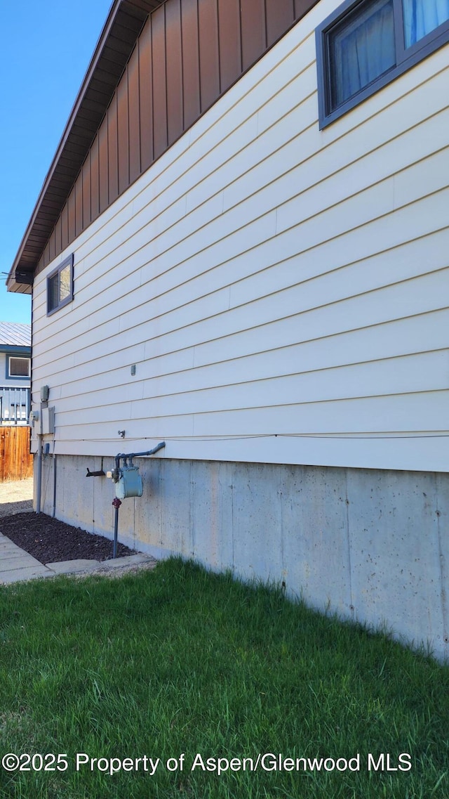936 Legion St, Craig, CO 81625 - view of side of home featuring a lawn