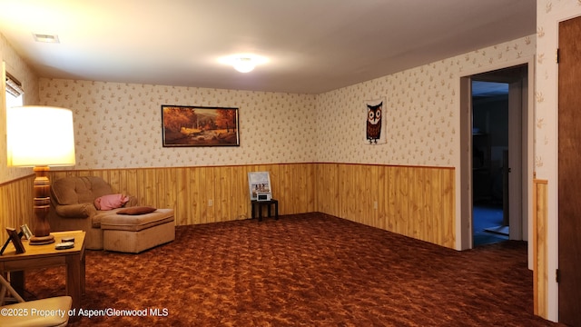936 Legion St, Craig, CO 81625 - sitting room with wallpapered walls, wainscoting, and carpet