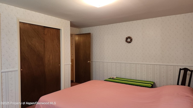 936 Legion St, Craig, CO 81625 - bedroom with wallpapered walls and a closet
