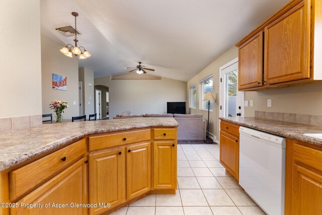 165 Harris Ln, Parachute, CO 81635 - kitchen with dishwasher, ceiling fan, vaulted ceiling, a peninsula, and light tile patterned flooring