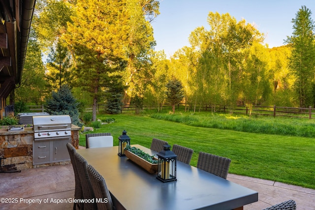 236 Bristlecone Dr, Carbondale, CO 81623 - view of patio / terrace featuring outdoor dining space and a wooded view