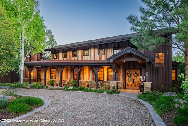 236 Bristlecone Dr, Carbondale, CO 81623 - rear view of house featuring french doors and stone siding