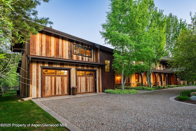 236 Bristlecone Dr, Carbondale, CO 81623 - view of front of home with gravel driveway and a garage