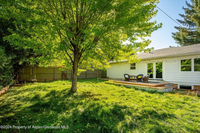 341 Park Dr, Glenwood Springs, CO 81601 - fenced backyard featuring a deck