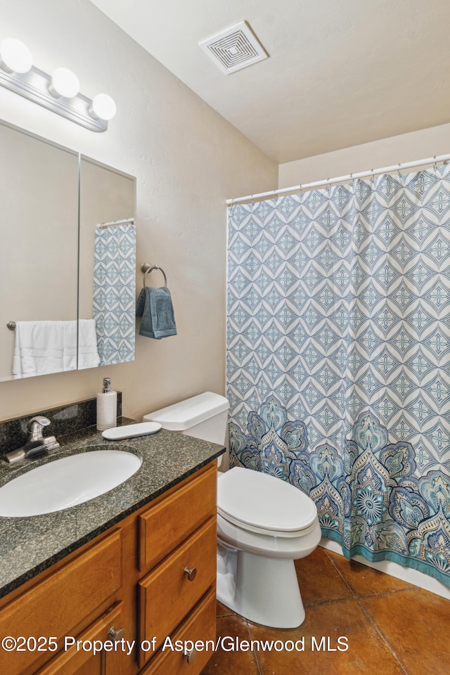 1913 Colorow Rd, Glenwood Springs, CO 81601 - full bath with vanity, tile patterned flooring, and curtained shower