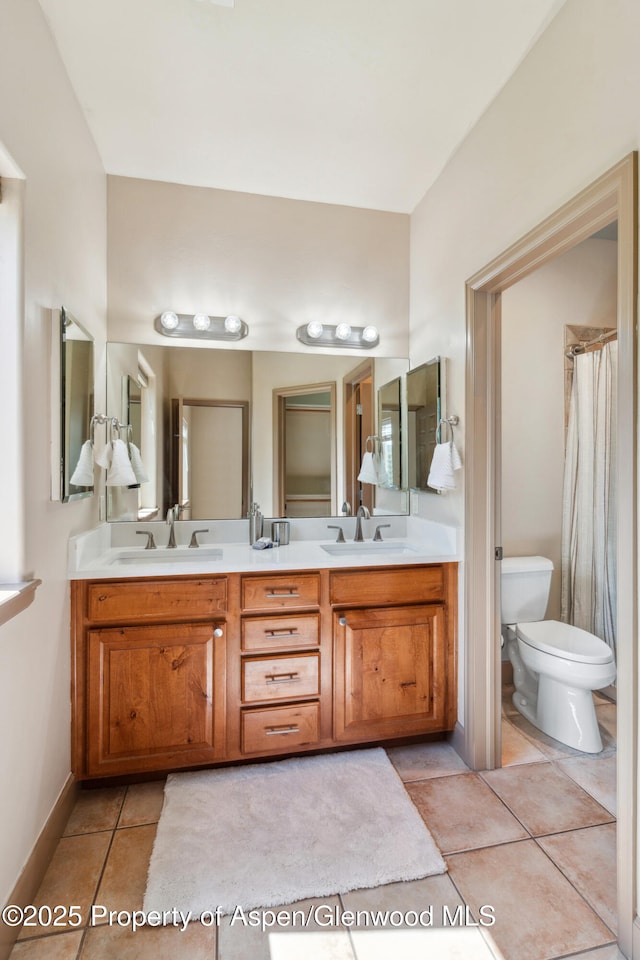 1913 Colorow Rd, Glenwood Springs, CO 81601 - bathroom featuring double vanity and tile patterned floors