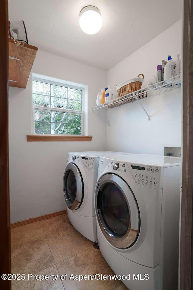 311 Sopris Cir, Basalt, CO 81621 - laundry area with separate washer and dryer and light tile patterned flooring
