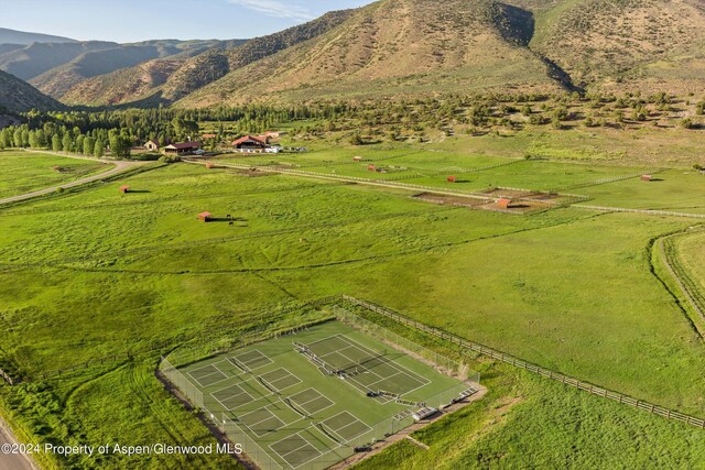 drone / aerial view with a rural view and a mountain view