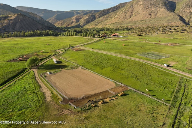 bird's eye view with a mountain view and a rural view