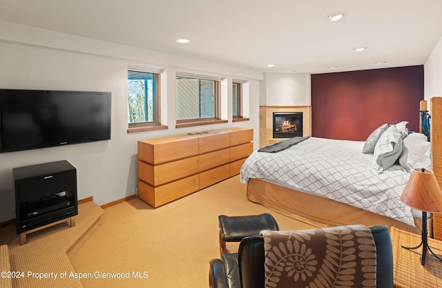 bedroom featuring light colored carpet