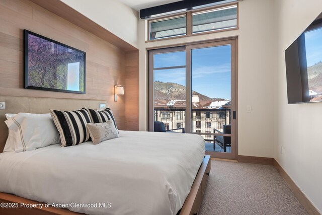 130 Wood Rd Unit 660-662, Snowmass Village, CO 81615 - carpeted bedroom with access to exterior and baseboards