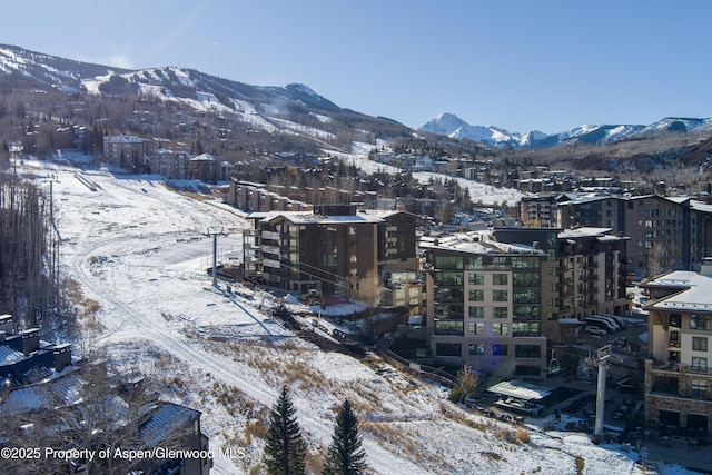 130 Wood Rd Unit 660-662, Snowmass Village, CO 81615 - snowy aerial view with a mountain view