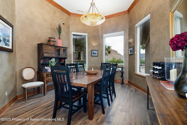 759 36 3/10 Rd, Palisade, CO 81526 - dining space featuring hardwood / wood-style floors, ornamental molding, and baseboards