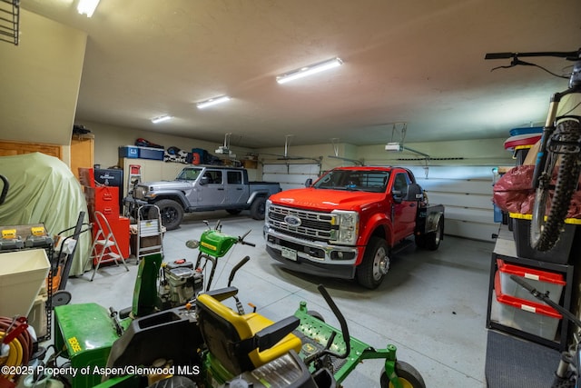 759 36 3/10 Rd, Palisade, CO 81526 - garage featuring a garage door opener
