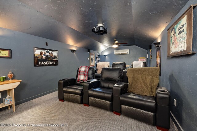 759 36 3/10 Rd, Palisade, CO 81526 - cinema featuring carpet floors, a ceiling fan, a wall unit AC, lofted ceiling, and baseboards