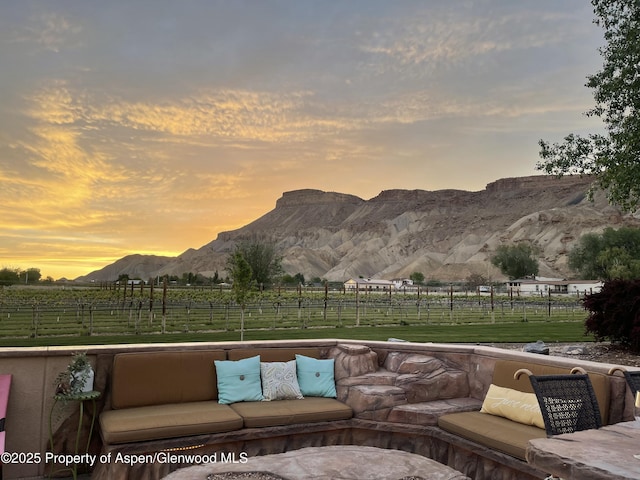 759 36 3/10 Rd, Palisade, CO 81526 - patio terrace at dusk with a mountain view and a rural view