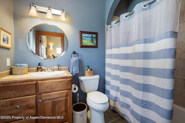 759 36 3/10 Rd, Palisade, CO 81526 - bathroom featuring toilet, curtained shower, and vanity